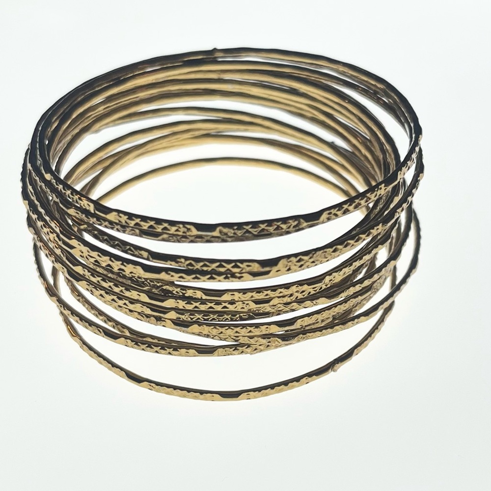 Lot of 17 Gold Tone Stack Bangle Bracelets